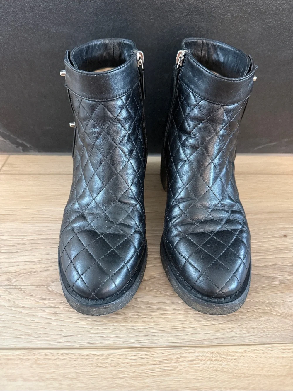 CHANEL Black Quilted Lambskin Ankle Boots with Silver CC Emblems